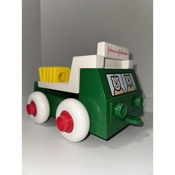 VTG Johnson & Johnson Green Plastic Toy Truck W Stackable Shapes 1983 Bears - Picture 1 of 6